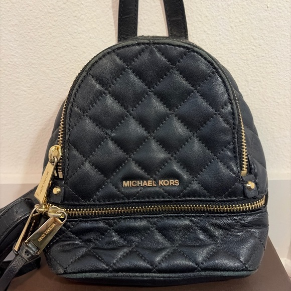 Michael Kors Handbags - Michael Kors Black Quilted Leather Mini Backpack Gold Hardware